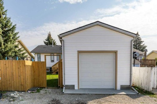 21 West Mcdougal Road, Cochrane, AB - Outdoor With Exterior