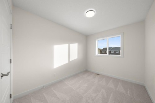 628 Sora Boulevard Se, Calgary, AB - Indoor Photo Showing Other Room