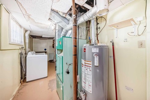 5248 Barron Drive Nw, Calgary, AB - Indoor Photo Showing Laundry Room
