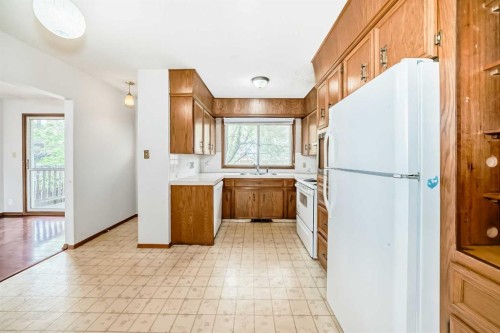 5248 Barron Drive Nw, Calgary, AB - Indoor Photo Showing Kitchen With Double Sink