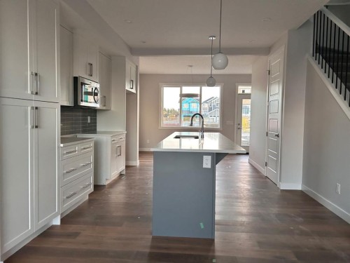 632 Sora Boulevard Se, Calgary, AB - Indoor Photo Showing Kitchen With Upgraded Kitchen