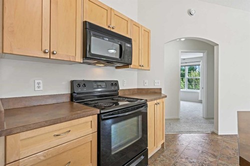 204-30 Panatella Landing Nw, Calgary, AB - Indoor Photo Showing Kitchen
