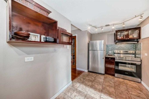 1-3511 15 Street Sw, Calgary, AB - Indoor Photo Showing Kitchen With Stainless Steel Kitchen