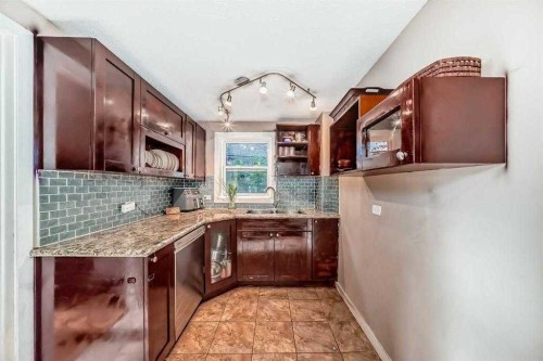 1-3511 15 Street Sw, Calgary, AB - Indoor Photo Showing Kitchen With Double Sink