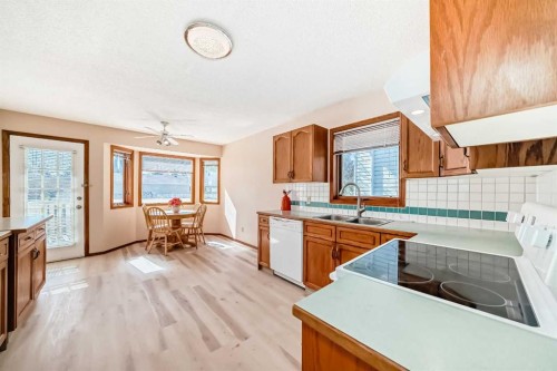247 Shawinigan Drive Sw, Calgary, AB - Indoor Photo Showing Kitchen With Double Sink