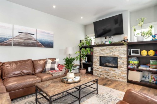 1907 37 Avenue Sw, Calgary, AB - Indoor Photo Showing Living Room With Fireplace
