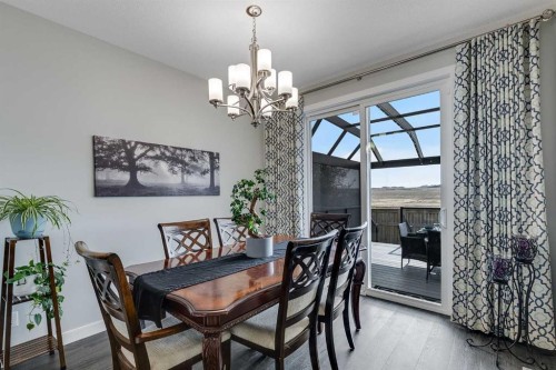 211 Willow Place, Cochrane, AB - Indoor Photo Showing Dining Room