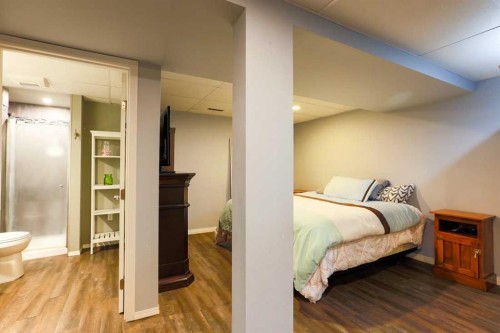 1118 Maple Avenue, Crossfield, AB - Indoor Photo Showing Bedroom