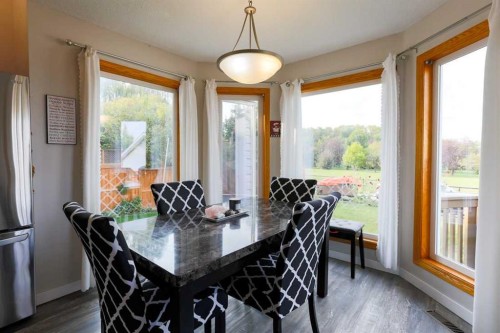 1118 Maple Avenue, Crossfield, AB - Indoor Photo Showing Dining Room