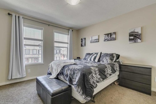 802-1001 8 Street Nw, Airdrie, AB - Indoor Photo Showing Bedroom