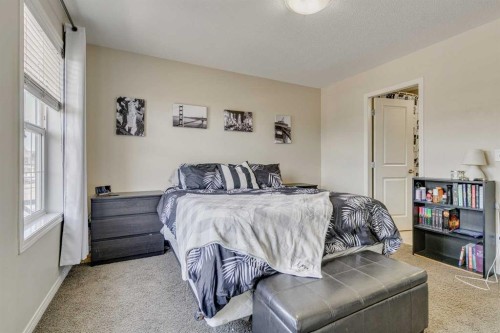 802-1001 8 Street Nw, Airdrie, AB - Indoor Photo Showing Bedroom