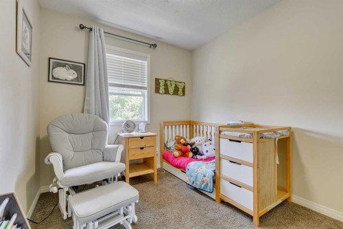 802-1001 8 Street Nw, Airdrie, AB - Indoor Photo Showing Bedroom
