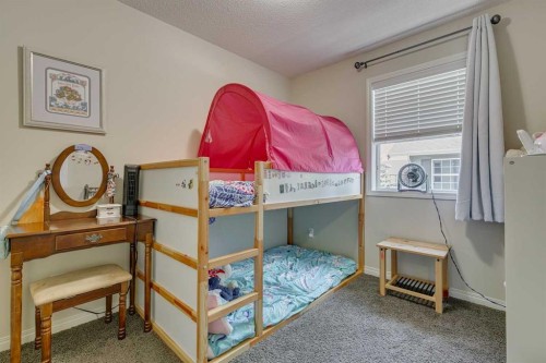 802-1001 8 Street Nw, Airdrie, AB - Indoor Photo Showing Bedroom