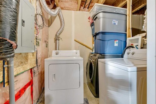 802-1001 8 Street Nw, Airdrie, AB - Indoor Photo Showing Laundry Room