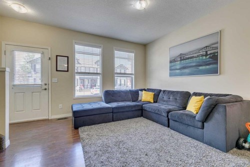 802-1001 8 Street Nw, Airdrie, AB - Indoor Photo Showing Living Room