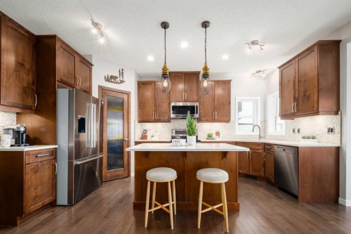 133 Cougar Ridge Close Sw, Calgary, AB - Indoor Photo Showing Kitchen With Stainless Steel Kitchen With Upgraded Kitchen