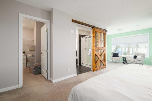 133 Cougar Ridge Close Sw, Calgary, AB - Indoor Photo Showing Bedroom