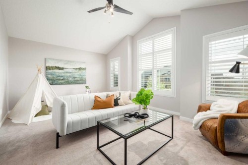 133 Cougar Ridge Close Sw, Calgary, AB - Indoor Photo Showing Living Room