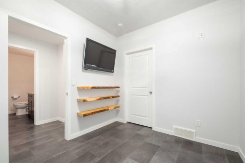 133 Cougar Ridge Close Sw, Calgary, AB - Indoor Photo Showing Other Room