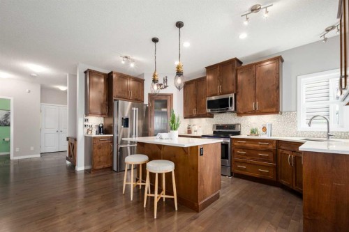 133 Cougar Ridge Close Sw, Calgary, AB - Indoor Photo Showing Kitchen With Stainless Steel Kitchen With Upgraded Kitchen
