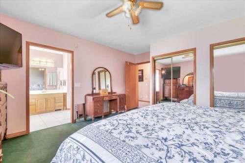 14 Grande Point Estates, Strathmore, AB - Indoor Photo Showing Bedroom