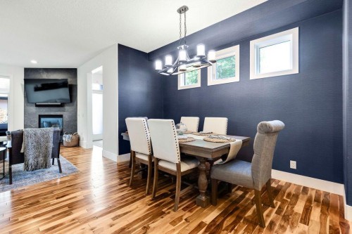 3015 26 Street Sw, Calgary, AB - Indoor Photo Showing Dining Room With Fireplace