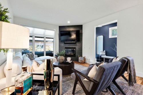 3015 26 Street Sw, Calgary, AB - Indoor Photo Showing Living Room With Fireplace