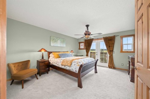 122 Hidden Creek Heights Nw, Calgary, AB - Indoor Photo Showing Bedroom