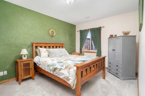 122 Hidden Creek Heights Nw, Calgary, AB - Indoor Photo Showing Bedroom