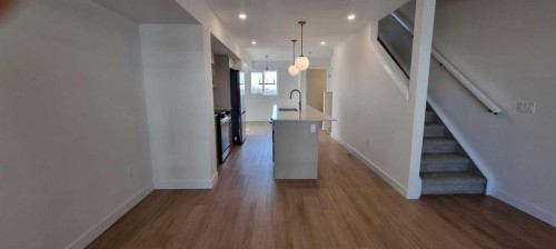 12-200 Belmont Street Sw, Calgary, AB - Indoor Photo Showing Other Room