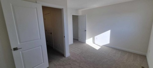 12-200 Belmont Street Sw, Calgary, AB - Indoor Photo Showing Other Room