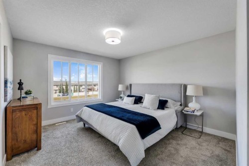 1209 Chinook Gate Bay Sw, Airdrie, AB - Indoor Photo Showing Bedroom