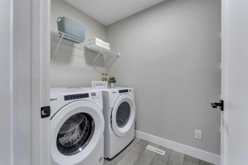 1209 Chinook Gate Bay Sw, Airdrie, AB - Indoor Photo Showing Laundry Room