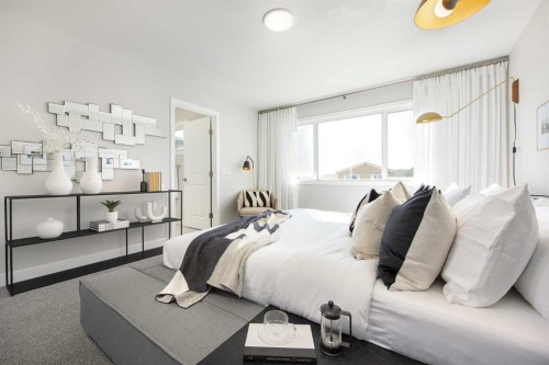 131 Wolf Creek Rise Se, Calgary, AB - Indoor Photo Showing Bedroom