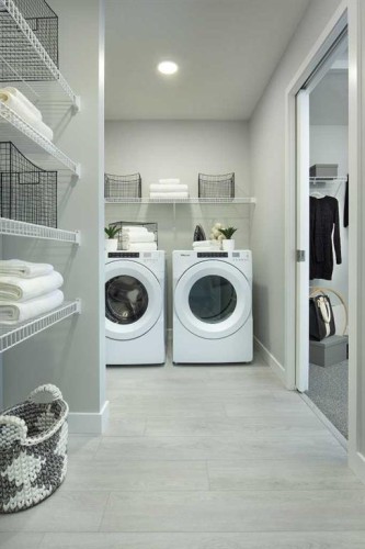 131 Wolf Creek Rise Se, Calgary, AB - Indoor Photo Showing Laundry Room