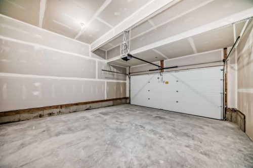 131 Wolf Creek Rise Se, Calgary, AB - Indoor Photo Showing Garage