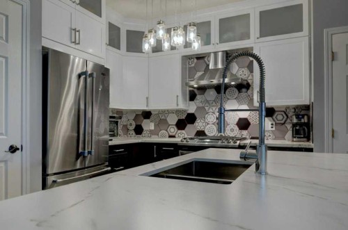 18380 Chaparral Street Se, Calgary, AB - Indoor Photo Showing Kitchen With Double Sink With Upgraded Kitchen