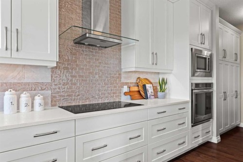 102 Ranch Road, Okotoks, AB - Indoor Photo Showing Kitchen With Upgraded Kitchen