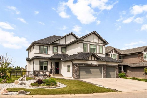 102 Ranch Road, Okotoks, AB - Outdoor With Facade