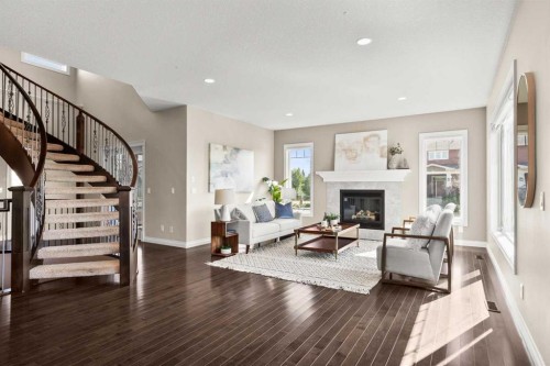 102 Ranch Road, Okotoks, AB - Indoor Photo Showing Other Room With Fireplace