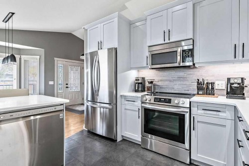 1957 High Country Drive Nw, High River, AB - Indoor Photo Showing Kitchen With Stainless Steel Kitchen With Upgraded Kitchen