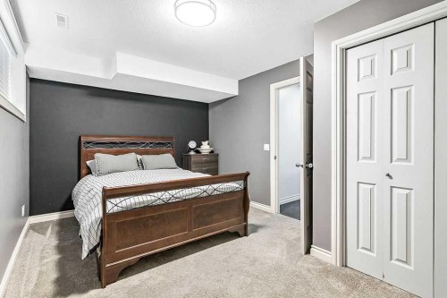 1957 High Country Drive Nw, High River, AB - Indoor Photo Showing Bedroom