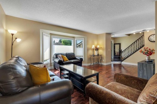 136 Castleglen Way Ne, Calgary, AB - Indoor Photo Showing Living Room