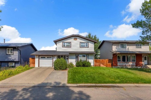 136 Castleglen Way Ne, Calgary, AB - Outdoor With Deck Patio Veranda With Facade