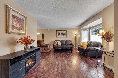 136 Castleglen Way Ne, Calgary, AB - Indoor Photo Showing Living Room