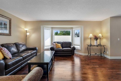 136 Castleglen Way Ne, Calgary, AB - Indoor Photo Showing Living Room