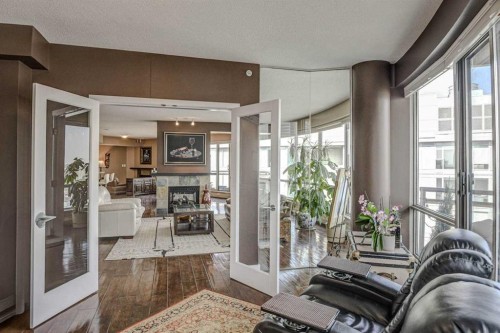 2401-1078 6 Avenue Sw, Calgary, AB - Indoor With Fireplace