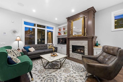 922 5 Street Nw, Calgary, AB - Indoor Photo Showing Living Room With Fireplace