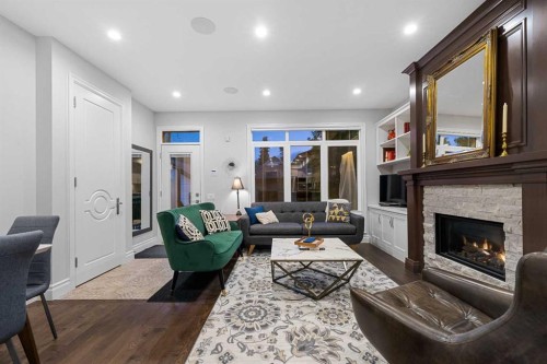 922 5 Street Nw, Calgary, AB - Indoor Photo Showing Living Room With Fireplace