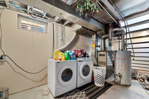 40 Pinecliff Close Ne, Calgary, AB - Indoor Photo Showing Laundry Room